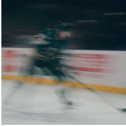 Motion-blurred skater in a green sweater