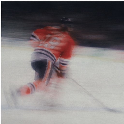 Motion-blurred skater in a New Jersey Devils sweater