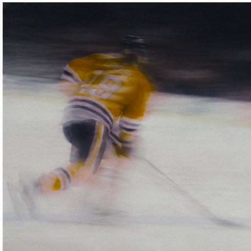 Motion-blurred skater in a Pittsburgh Penguins sweater