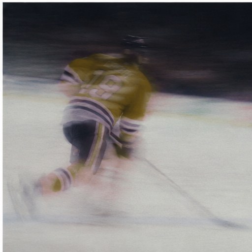 Motion-blurred skater in a Vegas Golden Knights sweater